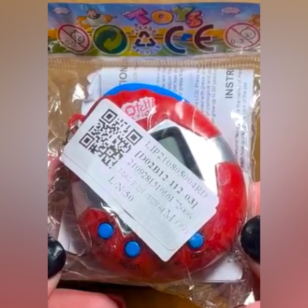 Tamagotchi connection sealed red and blue